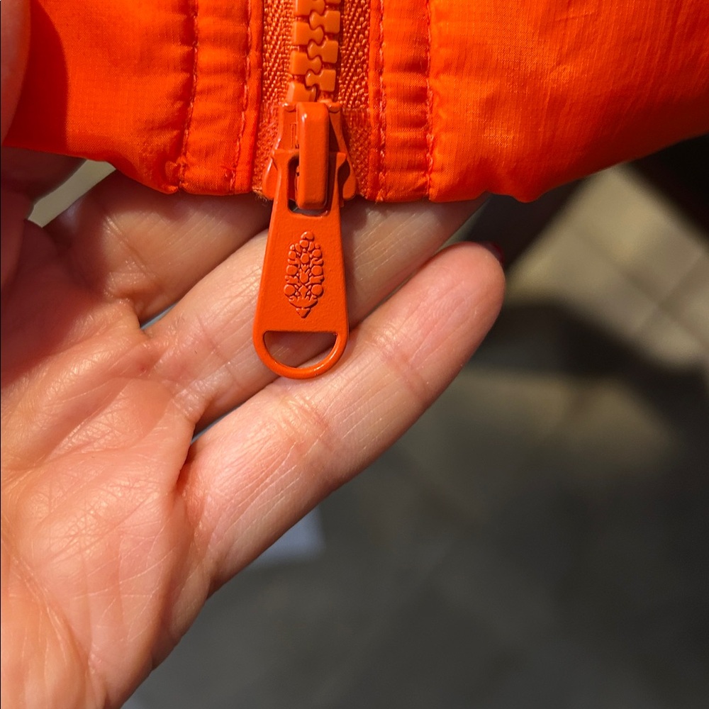 Free People Movement in a bubble Bright Orange Puffer Vest - Picture 5 of 7
